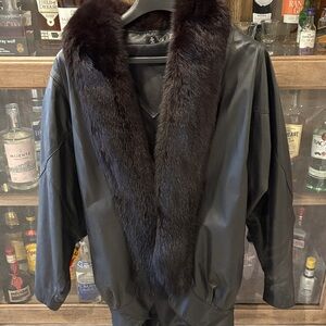 Woman’s Black Leather Jacket with Fur Collar